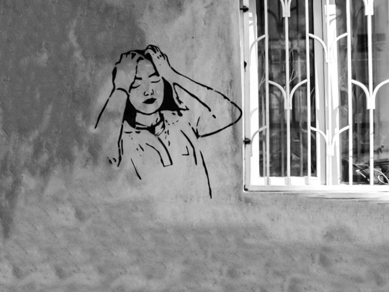 Street art showcasing a frustrated girl. <br/> 